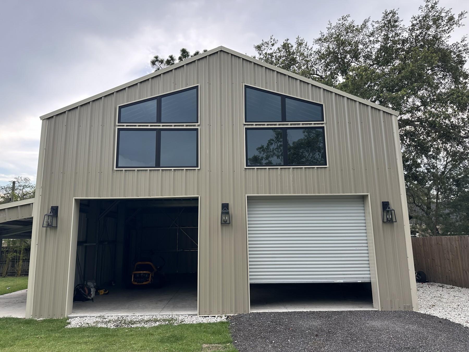 After: full run of angled trapezoid windows across the commercial building