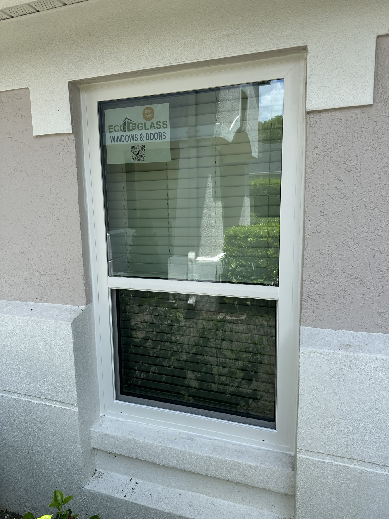 Window freshly installed, still carrying its EcoGlass manufacturer label